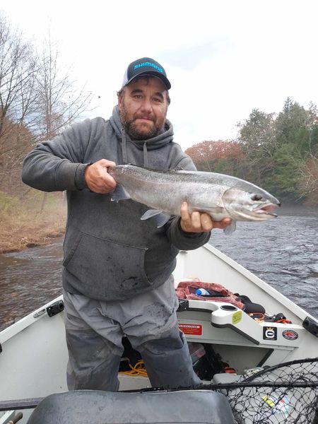 Drift boat river fishing for trophy salmon.